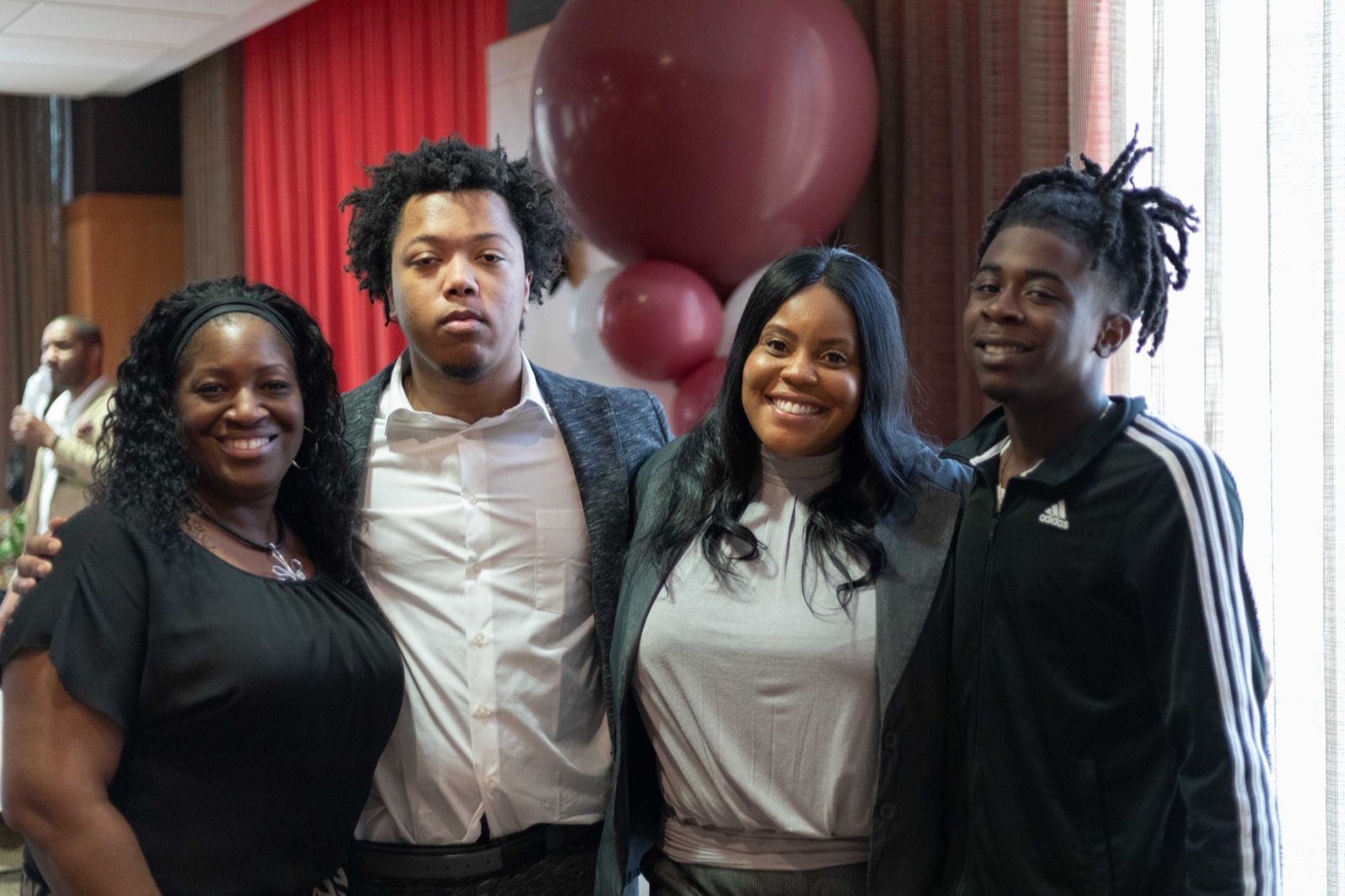 Dr. Hester with program graduates at the 2nd Chance Restorative Justice Program recognition ceremony